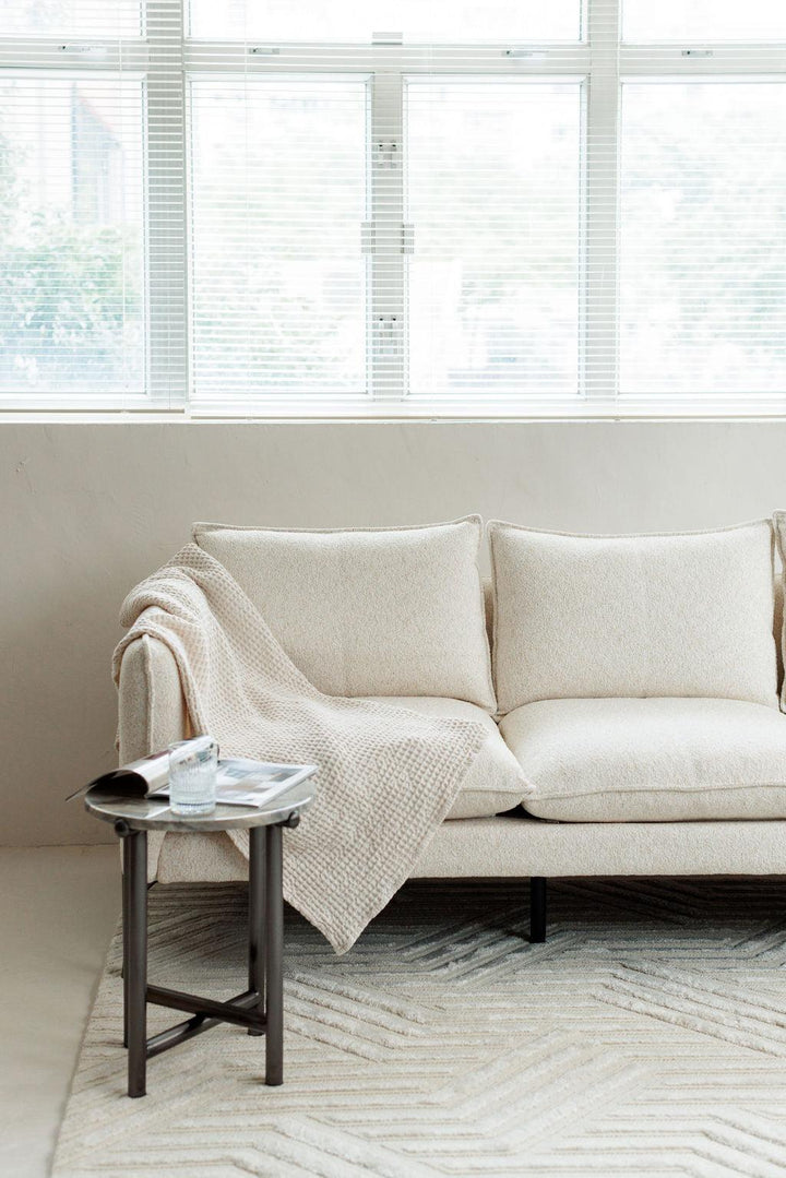 Gaston 3-Seater Sofa in white fabric at showroom